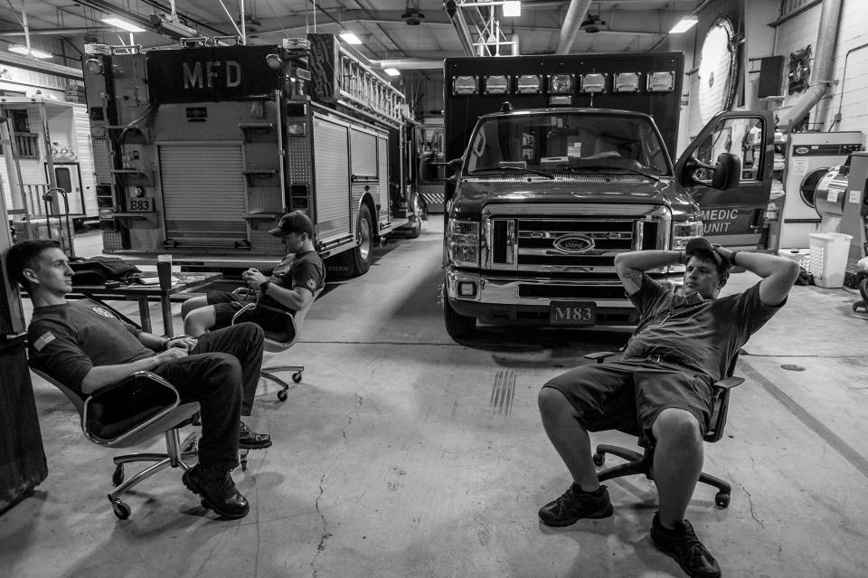 <p>Middletown fire fighters between calls. “This is a small town with big city problems,” says one. (Photograph by Mary F. Calvert for Yahoo News) </p>