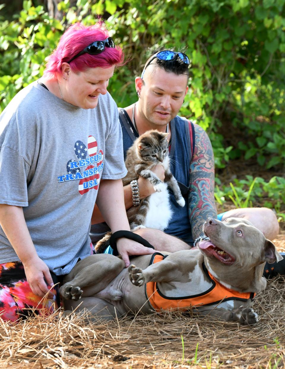 Robyn and Robert Feaganes of CH Lives Matter Rescue Inc., Palm Bay, with two of the several animals they have adopted with cerebellar hypoplasia, a brain condition that can lead to a loss in coordination and balance. Tank the Trainwreck is a humorous and sweet- natured red nose pitbull, and Billy Bobble Thornton is a cuddly cat who patiently poses for photos. For more info on their animal rescue, visit www.chlivesmatterrescue.com.