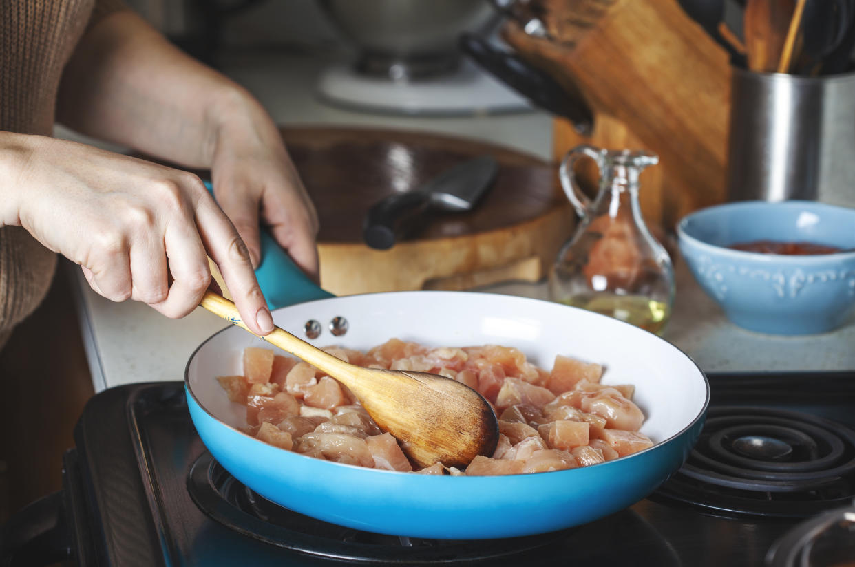 Chicken being cooked at home. (Getty Images)