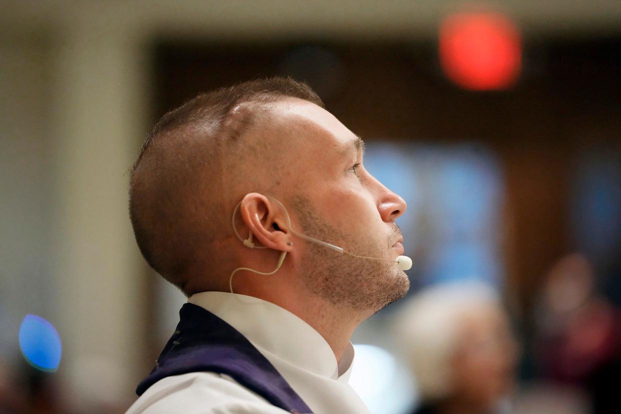 The Rev. TJ Lynch waits for the start of services at Gethsemane Lutheran Church on the North Side. The young pastor found out he had an inoperable brain tumor at 18.