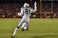 Los Angeles Chargers wide receiver Mike Williams (81) celebrates after catching a two-point conversion for the win against the Kansas City Chiefs during the second half of an NFL football game in Kansas City, Mo., Thursday, Dec. 13, 2018. The Los Angeles Chargers won 29-28. (AP Photo/Ed Zurga)