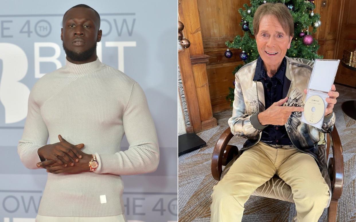 Stormzy, left, and Cliff Richard holding a copy of the rapper's album This Is What I Mean - Jim Dyson/Redfern Daniel Hinchliffe/PA Wire