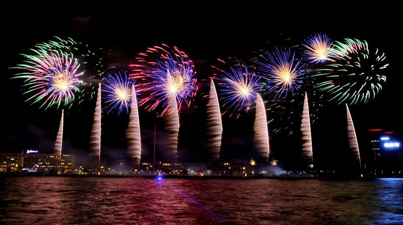 Fireworks explode over Daugava river during New Year celebration in Riga