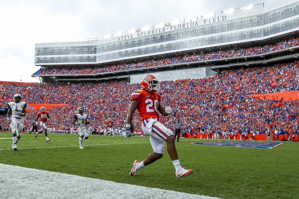 GAINESVILLE, FL – SEPTEMBER 30: Malik Davis #20 of the Florida Gators runs the ball into the end zone for a touchdown during a game against the Vanderbilt Commodores at Ben Hill Griffin Stadium on September 30, 2017 in Gainesville, Florida. (Photo by Logan Bowles/Getty Images)