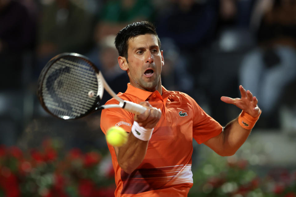 ROME, ITALY - MAY 14: Novak Djokovic of Serbia plays a forehand in the men's singles semi-final match against Casper Ruud of Norway on Day six of the Internazionali BNL D'Italia at Foro Italico on May 14, 2022 in Rome, Italy. (Photo by Alex Pantling/Getty Images)