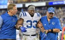 Oct 16, 2017; Nashville, TN, USA; Indianapolis Colts running back Robert Turbin (33) is helped off the field after suffering an apparent injury during the second half against the Tennessee Titans at Nissan Stadium. Mandatory Credit: Jim Brown-USA TODAY Sports