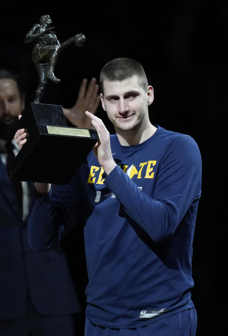 Denver Nuggets center Nikola Jokic accepts the Most Valuable Player award before Game 3 of an NBA second-round playoff series against the Phoenix Suns, Friday, June 11, 2021, in Denver. (AP Photo/David Zalubowski)