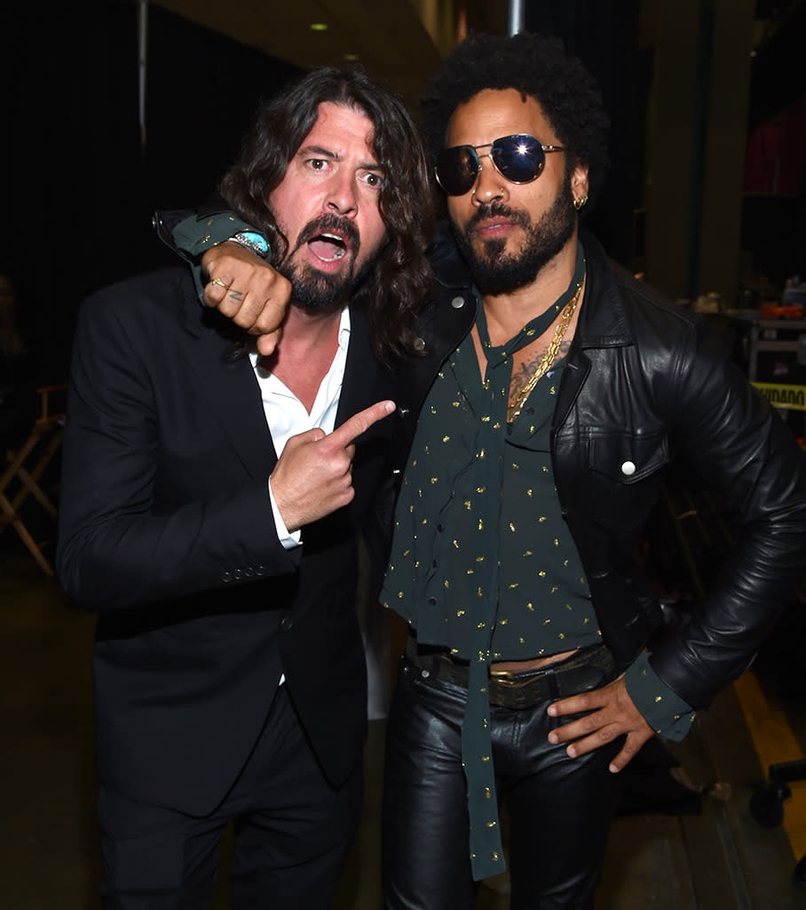 Musicians Dave Grohl (L) and Lenny Kravitz attend the 2016 MusiCares Person of the Year honoring Lionel Richie at the Los Angeles Convention Center on February 13, 2016 in Los Angeles, California. Photo by Larry Busacca/Getty Images for NARAS