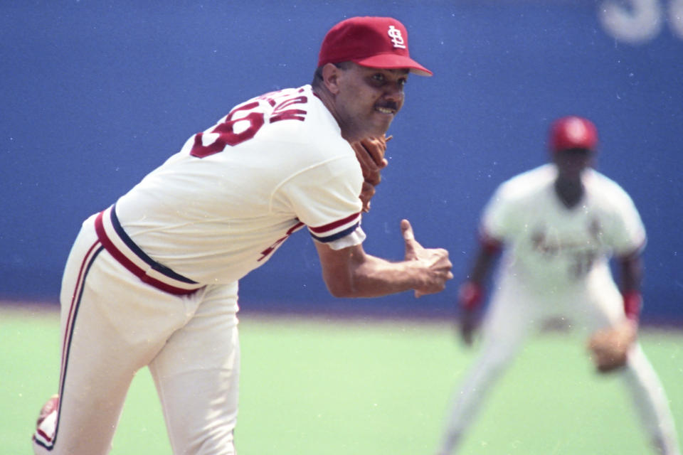 FILE - St. Louis Cardinals starting pitcher José DeLeón throws during the fourth inning of a baseball game against the Houston Astros, Aug. 19, 1990, in St. Louis, Mo. DeLeón, a major league pitcher for 13 seasons who led the National League in strikeouts for the St. Louis Cardinals in 1989, died Sunday evening, Feb. 25, 2024, at a hospital in Santo Domingo, Dominican Republic. He was 63. (AP Photo/File)