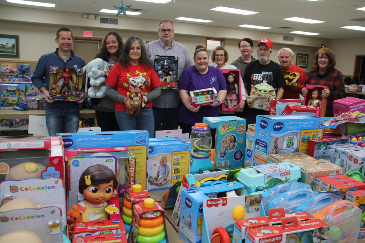 The 2023 toy drive volunteers include, from left, Bret Andorf, Heather Hoyme, Lisa Battani, Chris Myers, Tara Myers, Linda Andorf, Betty Hunt, Bob Hunt, John Andorf and Sharon Ulrich. Not pictured, Dennis Ulrich.