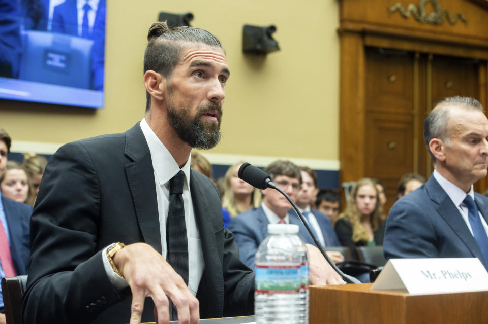 Michael Phelps, former Olympic athlete, testifies during a House Committee on Energy and Commerce Subcommittee on Oversight and Investigations hearing examining Anti-Doping Measures in Advance of the 2024 Olympics, on Capitol Hill, Tuesday, June 25, 2024, in Washington. (AP Photo/Rod Lamkey, Jr.)