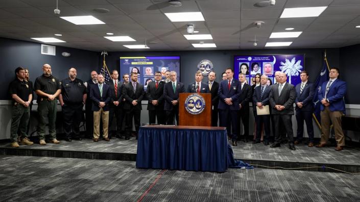 South Carolina Attorney General Alan Wilson, surrounded by law enforcement officials from around the state, announces a major investigation related to Mexican drug cartels on Thursday, Dec. 12, 2023.