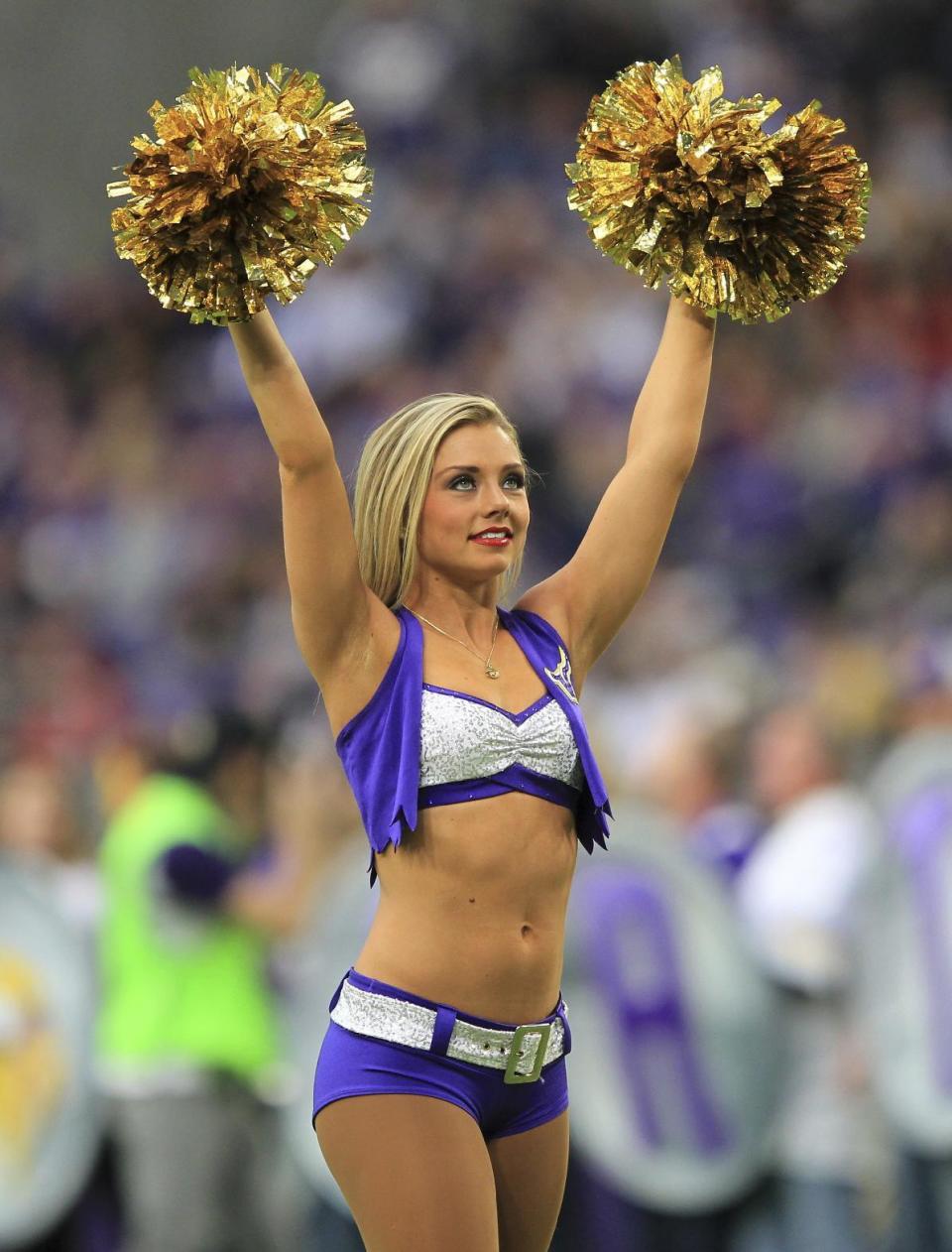 <p>A Minnesota Vikings cheerleader performs during the first half of an NFL football game against the Arizona Cardinals Sunday, Nov. 20, 2016, in Minneapolis. (AP Photo/Andy Clayton-King) </p>