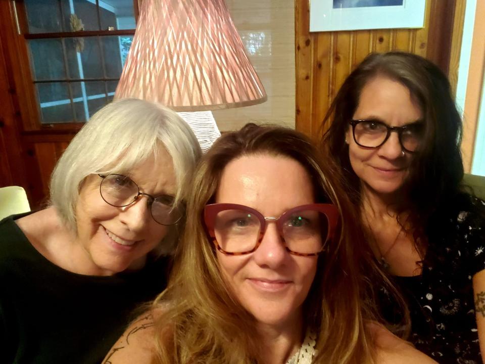 From left: Carol Lynne Knight, co-director; Kristine Snodgrass, co-director, and Terri Carrion, President of the Anhinga Press board; tackle 130 pages of "Rumors, Secrets & Lies" at a "proofing party" in August.