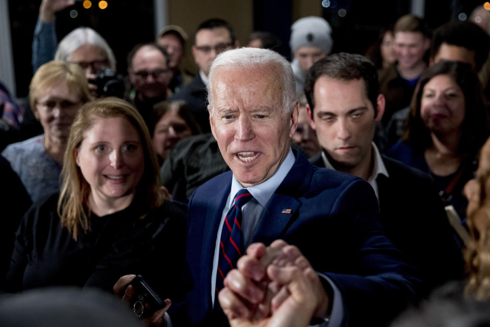 Democratic presidential candidate Joe Biden greets members of the audience at a campaign rally at Modern Woodmen Park, Sunday, Jan. 5, 2020, in Davenport, Iowa. (Photo: Andrew Harnik/AP)