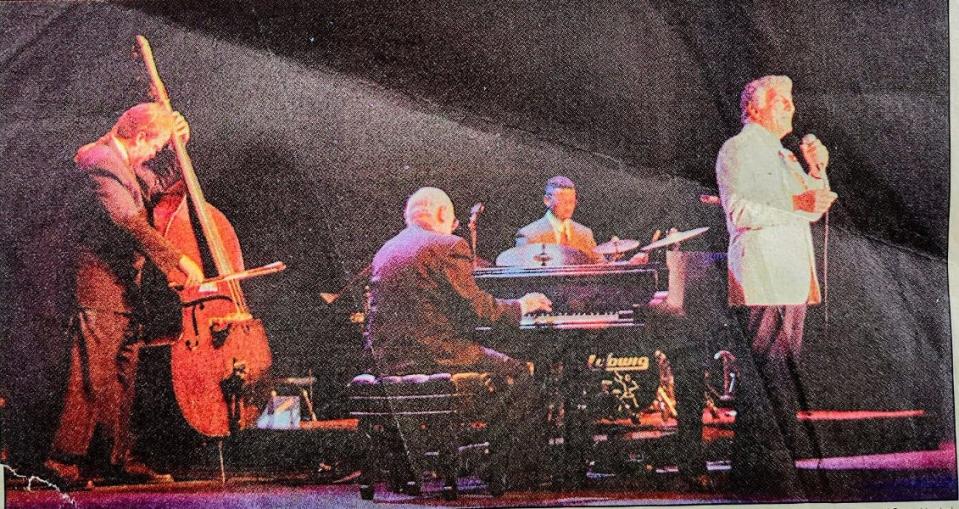 The late Tony Bennett, who recently died at age 96, was photographed by now-retired Repository photographer Scott Heckel and the singer's October 1994 show at Umstattd Hall in Canton, a benefit for the Boy Scouts of America, was reviewed by now-retired entertainment editor Dan Kane. The image showing a crinkled newspaper was pulled from Kane's archives upon learning of Bennett's death.