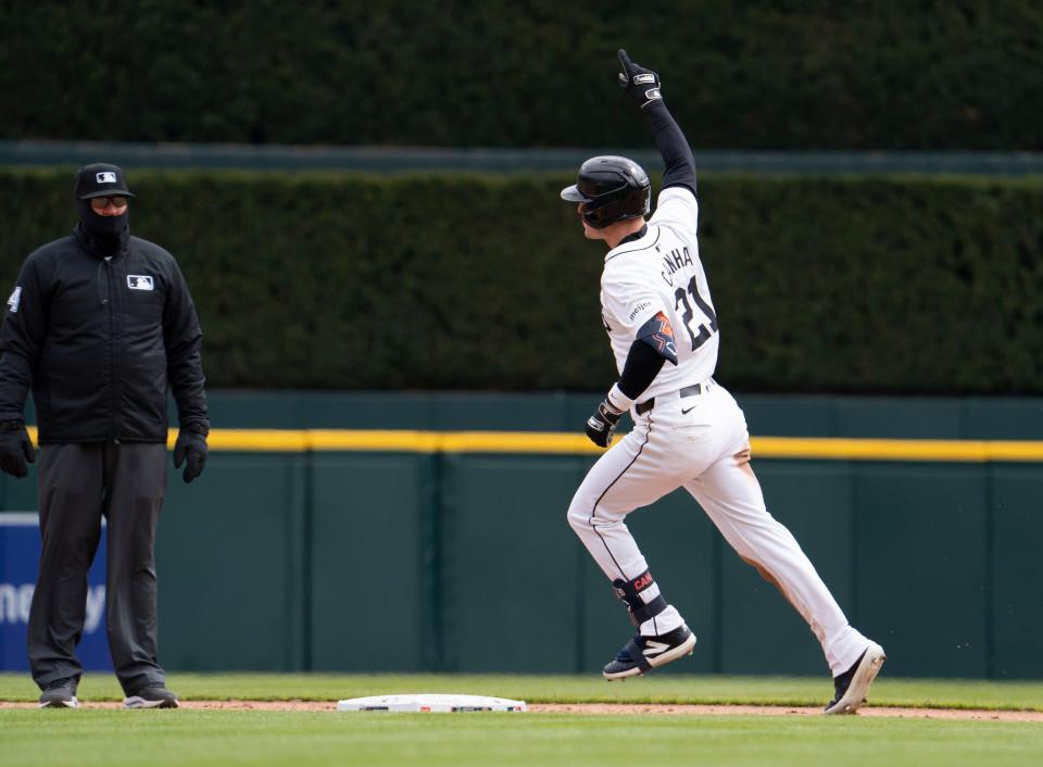 Detroit Tigers designated hitter Mark Canha celebrates his sixth-inning homer as the Detroit Tigers take on the Oakland Athletics for the Detroit home opener at Comerica Park on Friday, April 5, 2024.