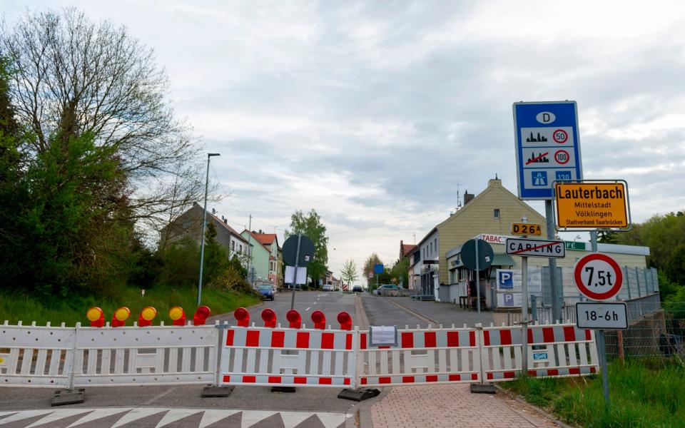 FILES) This file photo taken on April 18, 2020 shows the closed German-French border between Carling in France and Lauterbach in Germany, on the 33rd day of a lockdown in France aimed at curbing the spread of the COVID-19 infection caused by the novel coronavirus. - An European coordination for a return to free movement between European countries is delicate, between health imperatives and economic emergency, after the closings of the borders which have damaged a symbol of the European Union. (Photo by JEAN-CHRISTOPHE VERHAEGEN / AFP) (Photo by JEAN-CHRISTOPHE VERHAEGEN/AFP via Getty Images) - JEAN-CHRISTOPHE VERHAEGEN/AFP