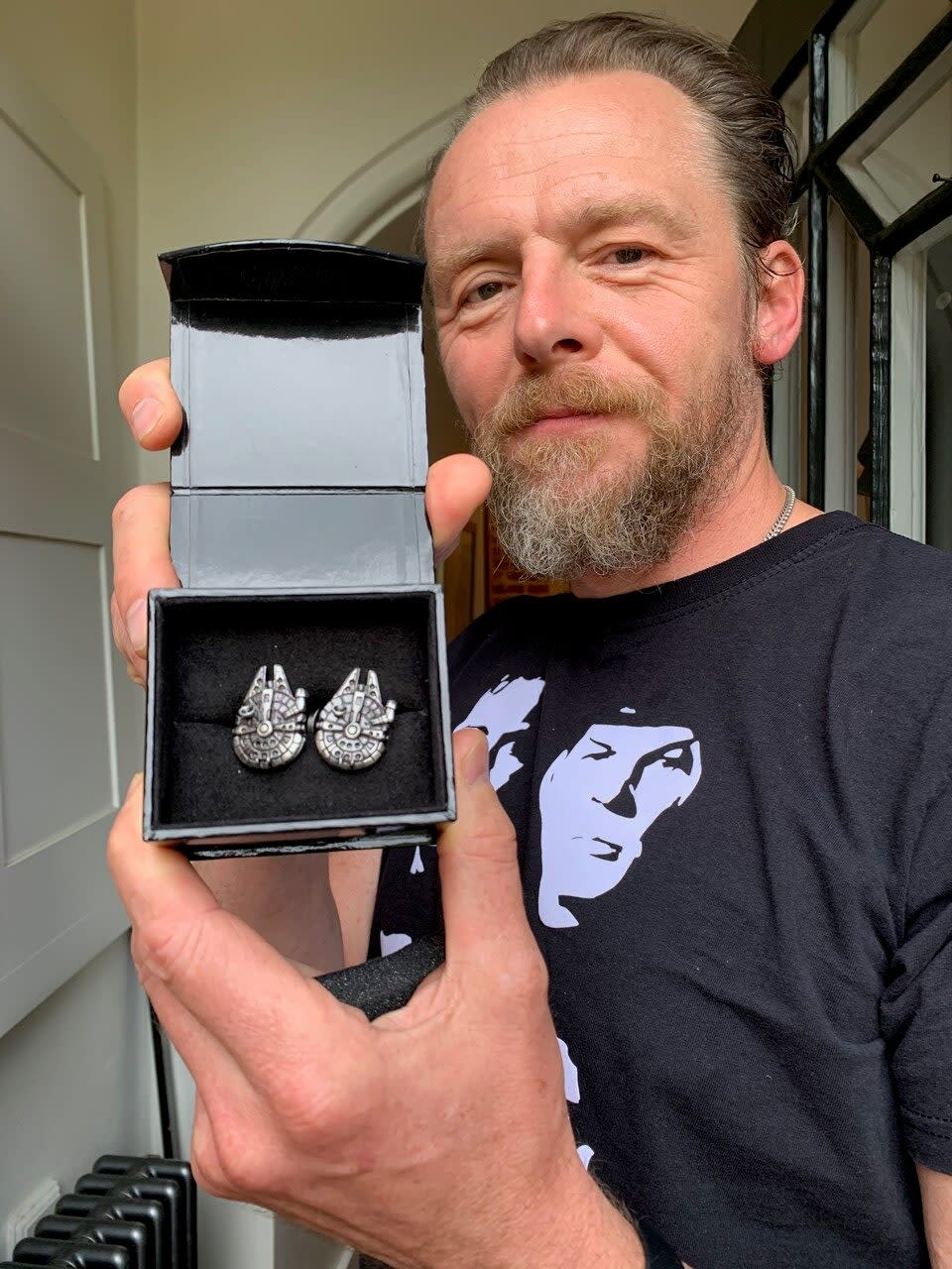 Pegg donated a pair of cufflinks (Simon Pegg/Oxfam/PA)