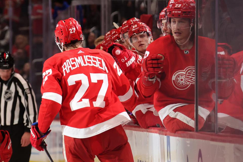Red Wings forward Michael Rasmussen celebrates his goal with teammates during the second period of the Wings' 4-1 win over the Rangers on Thursday, Feb. 23, 2023, at Little Caesars Arena.