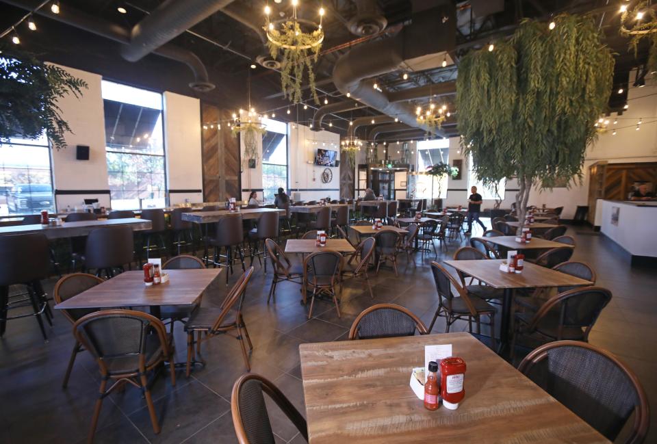 The large and well lit dining area at the new Silo Brunch Bar. Seating options include small tables, high-top tables, and at the bar.