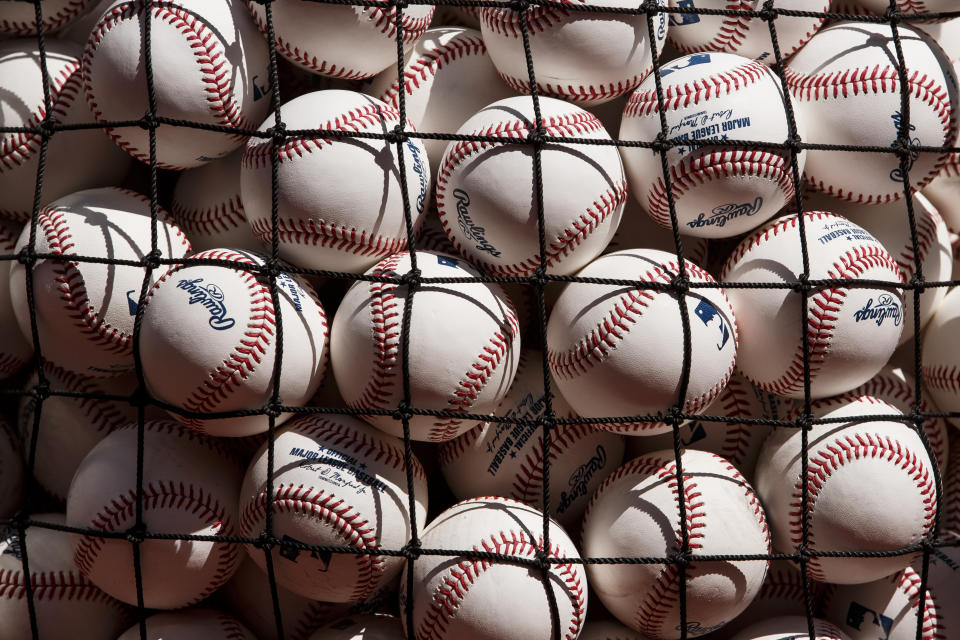 TORONTO, ON - AUGUST 27: Rawlings baseballs behind netting ahead of the MLB game between the Toronto Blue Jays and the Los Angeles Angels at Rogers Centre on August 27, 2022 in Toronto, Canada. (Photo by Cole Burston/Getty Images)