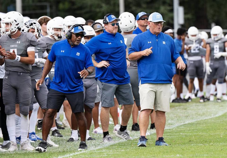 Modesto head coach Rusty Stivers, right, calls out to his offense during the game with Santa Rosa at Modesto Junior College in Modesto, Calif., Saturday, September 9, 2023.