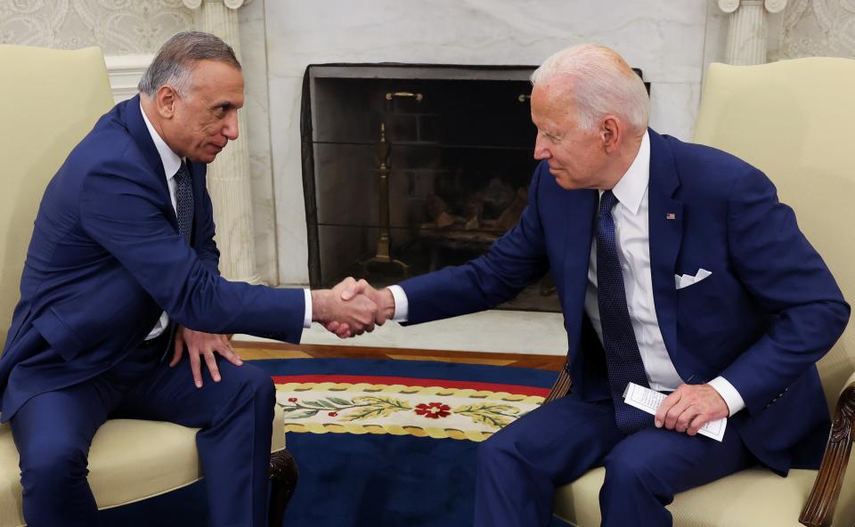 Joe Biden greets Iraq's Prime Minister Mustafa Al-Kadhimi during a bilateral meeting in the Oval Office (REUTERS)