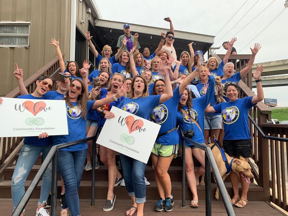 The Humane Society of Northwest Louisiana volunteers celebrate during the Give for Good online fundraiser, presented by The Community Foundation of North Louisiana.