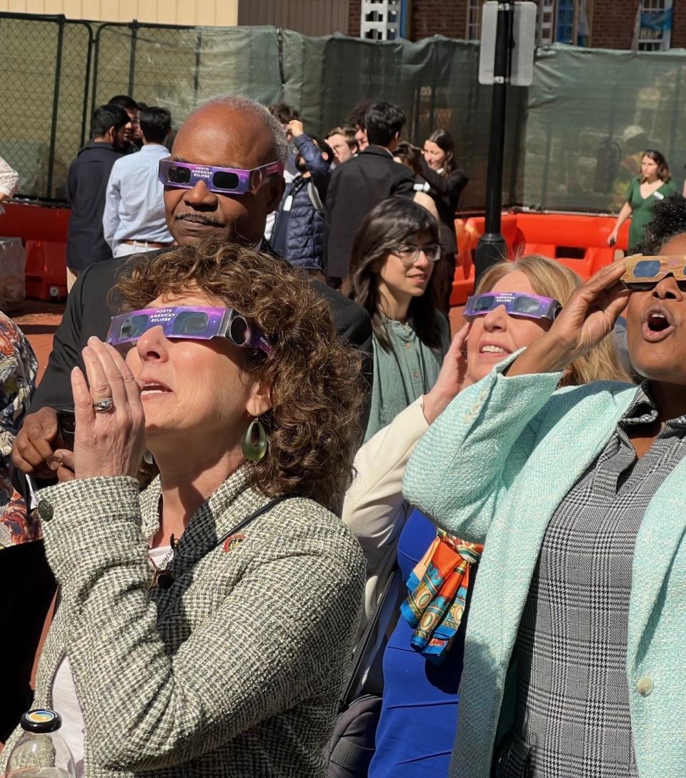 From left, Maryland Sens. Benjamin Brooks, D-Baltimore County, Shelly Hettleman, D-Baltimore County, Mary Beth Carozza, R-Worcester/Wicomico/Somerset, Mary Washington, D-Baltimore, wear solar eclipse glasses for viewing the phenomenon on April 8, 2024.