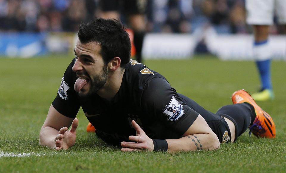 Manchester City's Alvaro Negredo reacts after missing a scoring opportunity during their FA Cup third round soccer match against the Blackburn Rovers at Ewood Park in Blackburn, northwest England January 4, 2014. REUTERS/Phil Noble (BRITAIN - Tags: SPORT SOCCER TPX IMAGES OF THE DAY)
