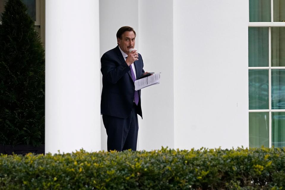 Michael Lindell, CEO of My Pillow, Inc., waits to go into the West Wing of the White House, Friday, Jan. 15, 2021, in Washington.