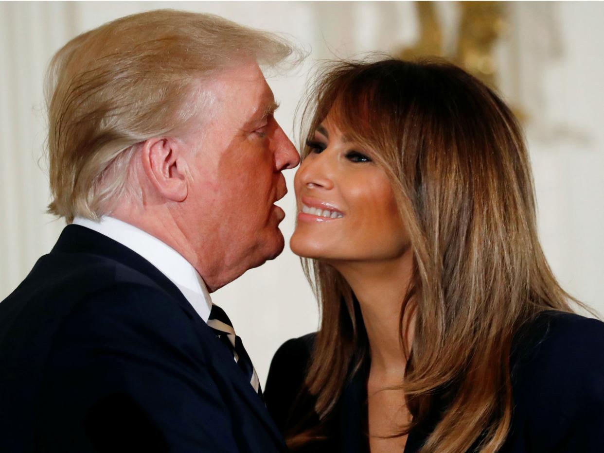 Donald Trump kisses his wife first lady Melania Trump: REUTERS/Leah Millis