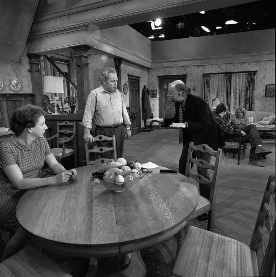 ALL IN THE FAMILY featuring Jean Stapleton and Carroll O'Connor speaking to the show's creator/writer: Norman Lear. Image dated  December 22, 1970. 