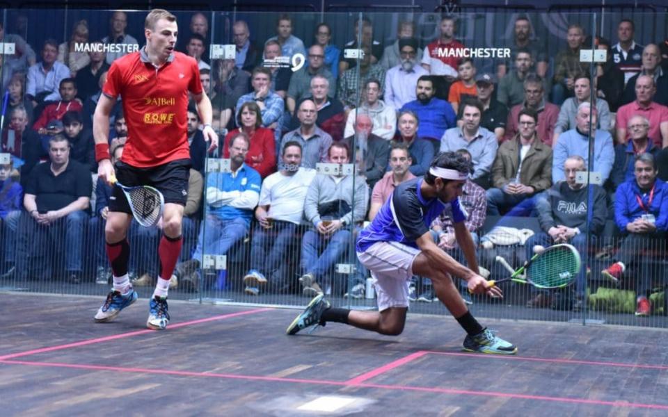 Nick Matthew, left, overcame a broken, then sanded floor at the World Championships