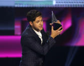 2017 American Music Awards – Show – Los Angeles, California, U.S., 19/11/2017 – Niall Horan accepts the award for New Artist of the Year. REUTERS/Mario Anzuoni