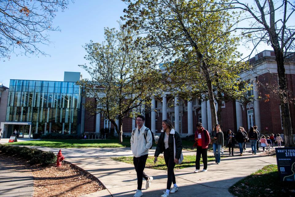 Students walk past the 6 Magnolia Circle and Mayborn building at Vanderbilt University last fall.