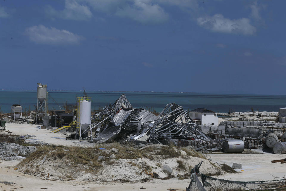 A concrete factory lays shattered, destroyed by Hurricane Dorian in Marsh Harbor, Abaco Island, Bahamas, Saturday, Sept. 7, 2019. Search and rescue teams were still trying to reach some Bahamian communities isolated by floodwaters and debris Saturday after Dorian struck the northern part of the archipelago last Sunday. (AP Photo/Fernando Llano)