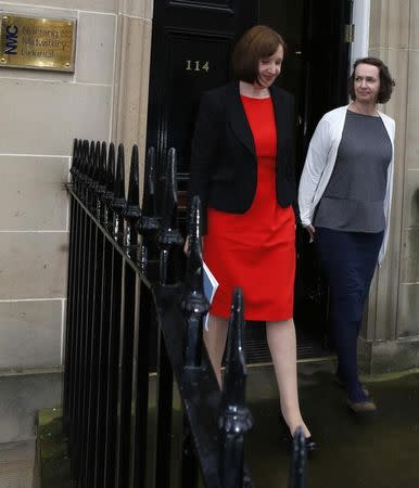 Pauline Cafferkey a nurse who volunteered to treat Ebola patients in West Africa, then survived the disease herself, leaves a hearing after being cleared of misconduct charges in Edinburgh, Scotland, Britain September 14 2016. REUTERS/Russell Cheyne