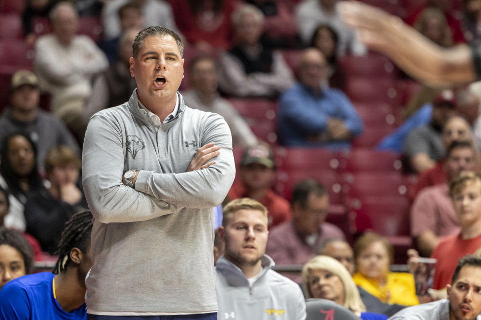 Morehead State head coach Preston Spradlin directs his players during the first half of an NCAA college basketball game against Alabama, Monday, Nov. 6, 2023, in Tuscaloosa, Ala. (AP Photo/Vasha Hunt)