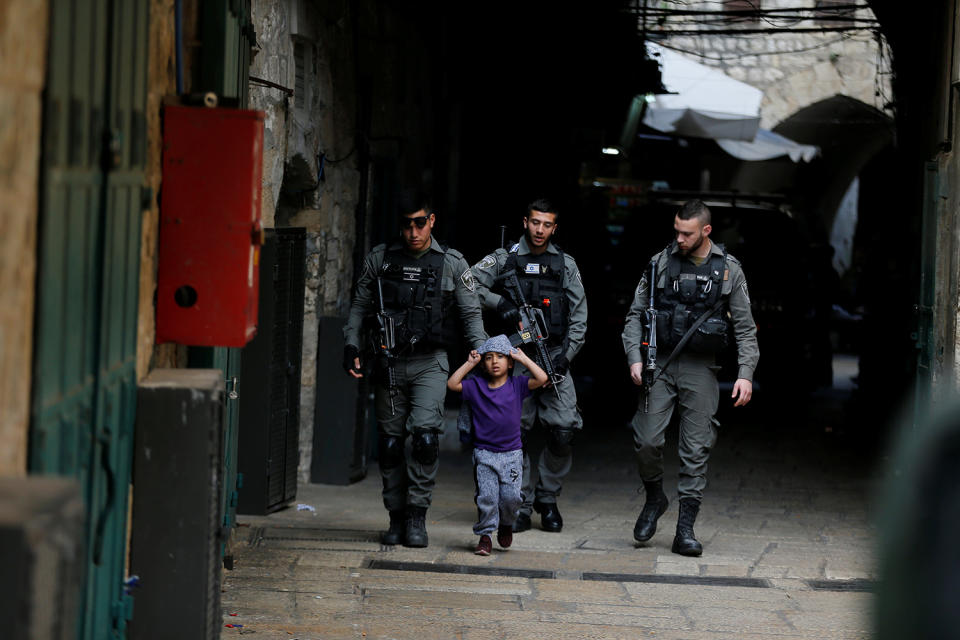 Escorted from a crime scene in Jerusalem