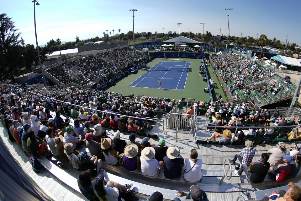 Danielle Collins, bottom, of the United States, serves to Daria Kasatkina, top, of Russia, during the finals at the Mubadala Silicon Valley Classic tennis tournament in San Jose, Calif., Sunday, Aug. 8, 2021. (AP Photo/Tony Avelar)