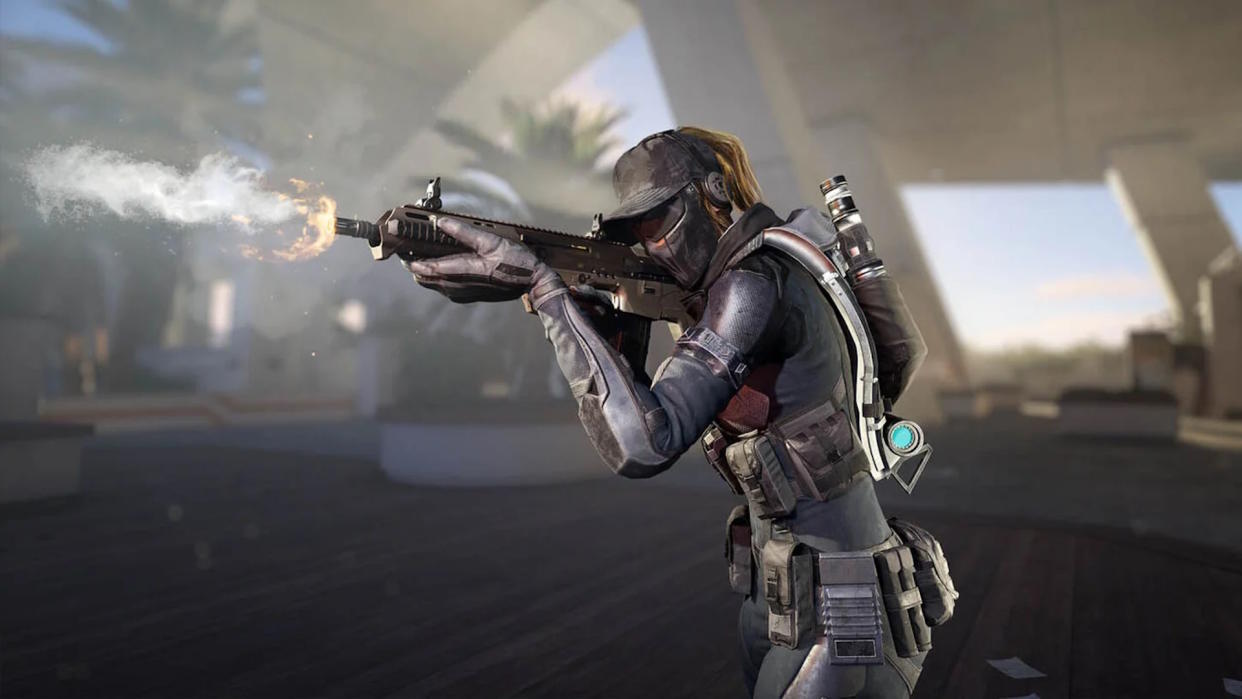  XDefiant promo image - woman in a commando-style outfit firing a rifle. 