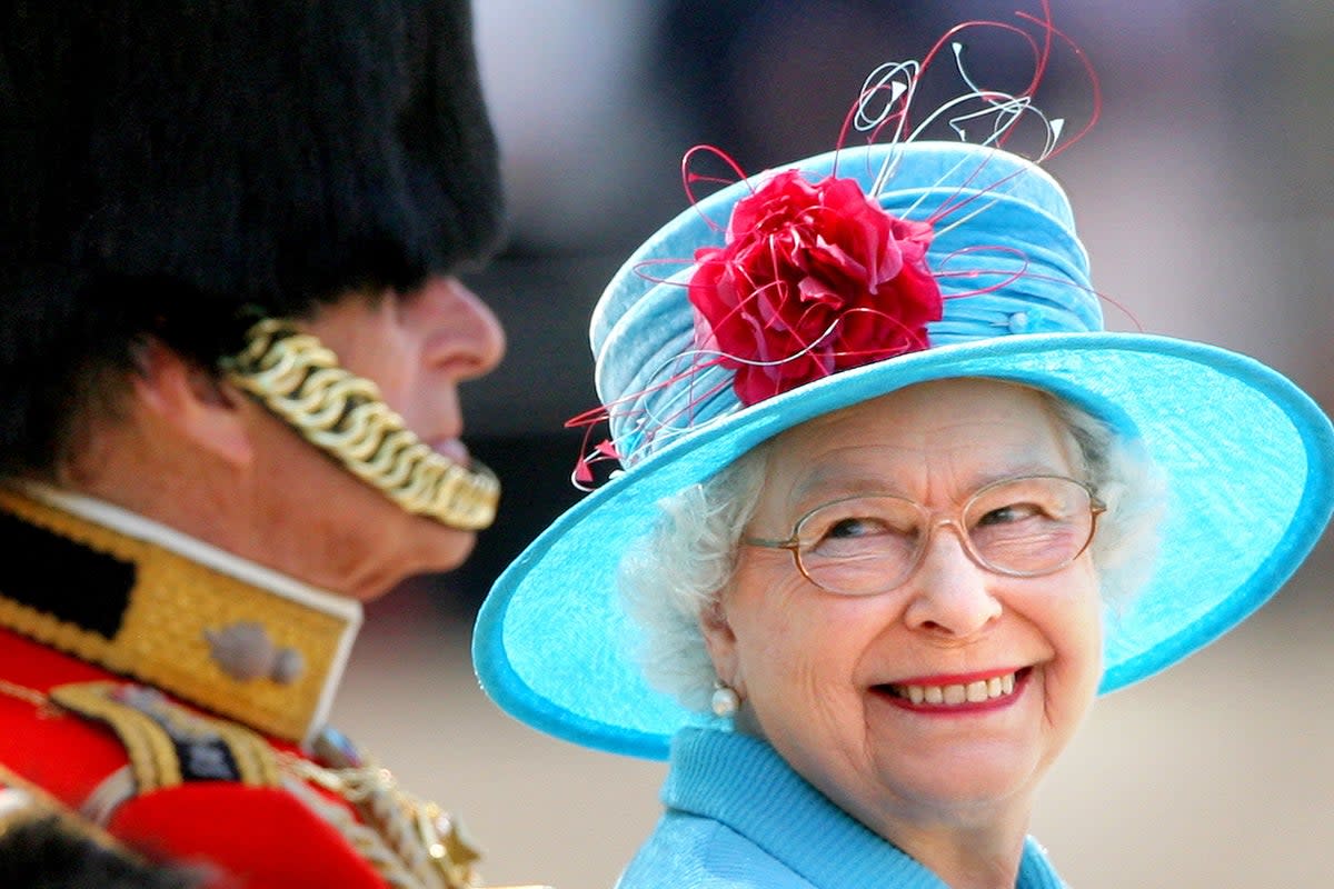 The Queen smiles at the Duke of Edinburgh on Horse Guards Parade during the annual Trooping the Colour parade (Lewis Whyld/PA) (PA Archive)