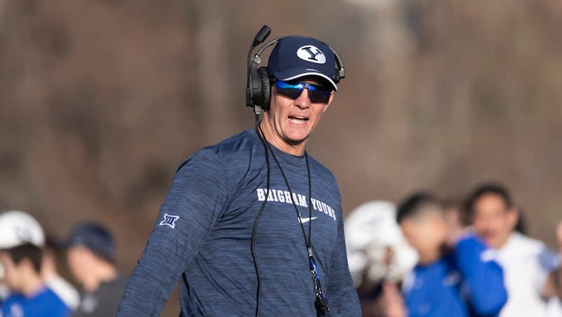 BYU defensive coordinator Jay Hill yells to the team during a practice on the SAB outdoor practice fields at the start of spring camp in Provo on Thursday, Feb. 29, 2024. Hill is in his second year calling the defensive shots for the Cougars.