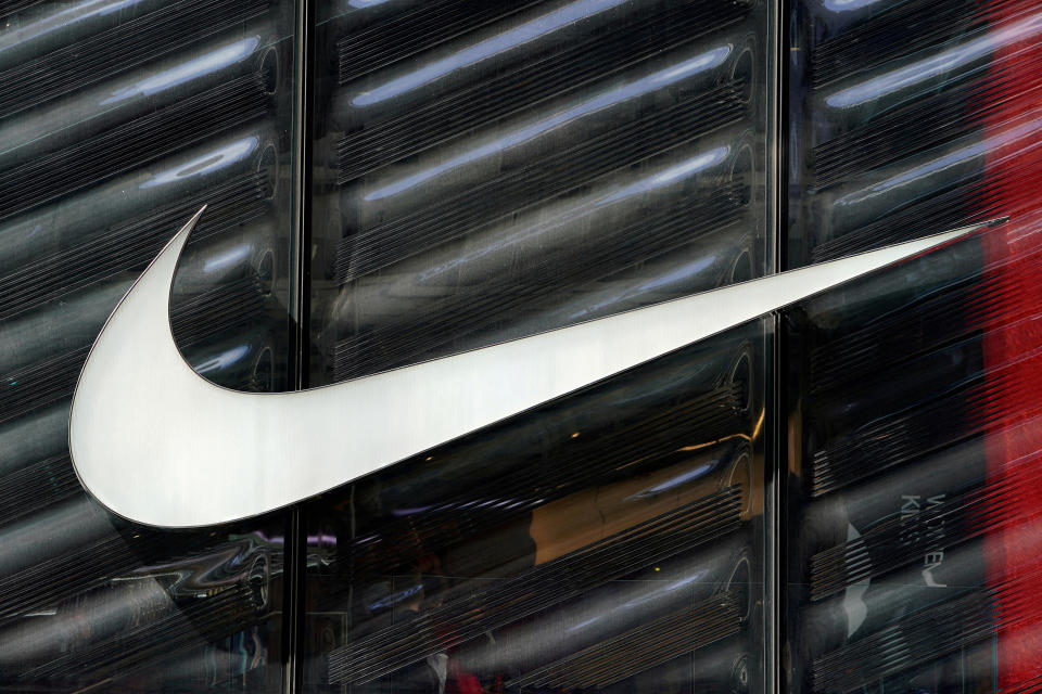 ARCHIVE PHOTO: The Nike swoosh logo is seen outside the store on 5th Ave in New York City, New York, U.S., March 19, 2019. REUTERS/Carlo Allegri/File photo