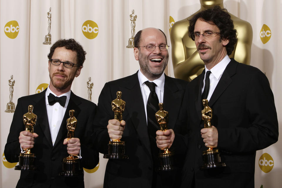 FILE - Writer-director Ethan Coen, from left, producer Scott Rudin and writer-director Joel Coen pose with their Oscars after the film "No Country for Old Men" won best motion picture of the year at the 80th Academy Awards in Los Angeles on Feb. 24, 2008. Rudin, one of the most successful and powerful producers, with a heap of Oscars and Tonys to show for it, has long been known for his torturous treatment of an ever-churning parade of assistants. Such behavior has long been engrained — and sometimes even celebrated — in show business. (AP Photo/Kevork Djansezian, File)
