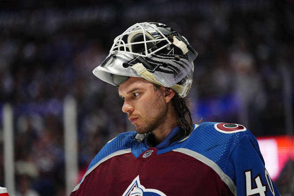 Colorado Avalanche goaltender Alexandar Georgiev pauses during the third period of Game 1 of the team's first-round NHL hockey playoff series against the Seattle Kraken on Tuesday, April 18, 2023, in Denver. (AP Photo/Jack Dempsey)