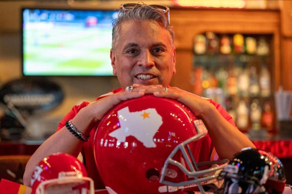 J.R. Morales, a Kansas City Chiefs fan, is seen next to a vintage Dallas Texans helmet on a table on Tuesday, Feb. 6, 2024, in Lubbock, Texas. The helmet used to belong to his father and holds significant sentimental value for Morales.