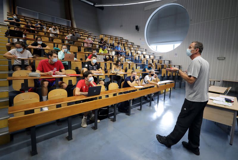 Students of the faculty of sport sciences attend a class in an auditorium at the Universite Cote d'Azur in Nice